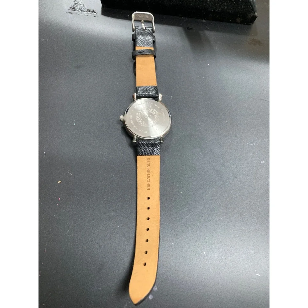 Anne Klein AK/1155 Crystal Bezel Black Dial Leather Strap Watch Womens